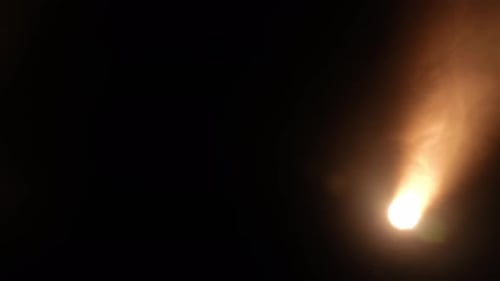 Bright Spotlights Beam From Professional Lighting Equipment Sparkle in the Dark with Floating Smoke