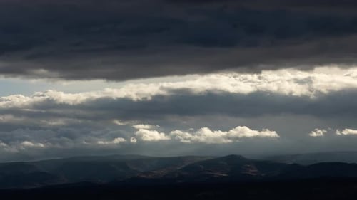Illuminated Clouds in Dark Storm Timelapse Wide
