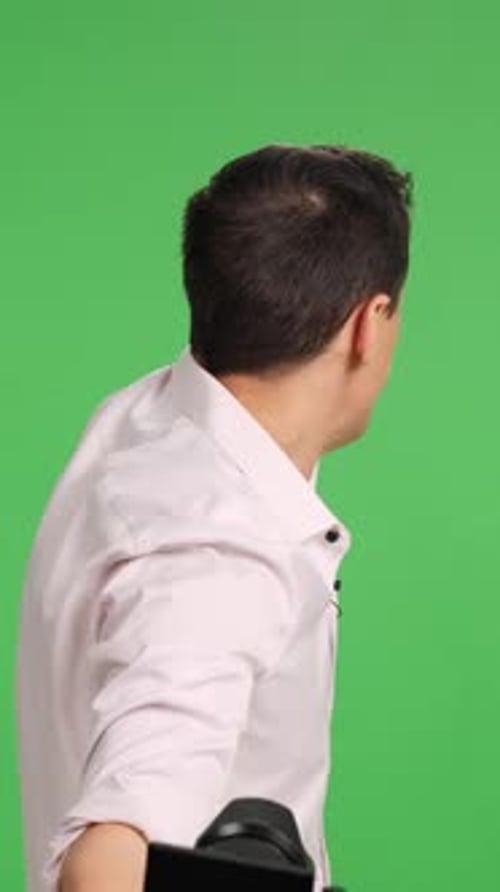 Content Creator Sharing Exciting News on Green Screen