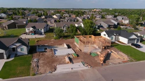 Aerial view of residential housing construction in suburban neighborhood