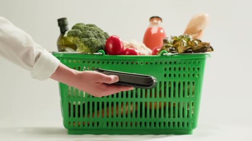 Food Shopping Delivery Paying with Credit Bank Card in Shop