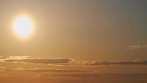 At dusk, the sky was ablaze with fiery hues, signaling the end of another day. As the sun disappeare