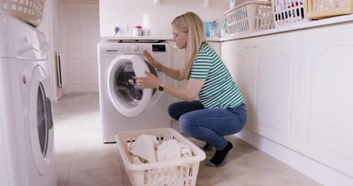 Washing machine, laundry and woman cleaning fabric for home care, apartment housekeeping
