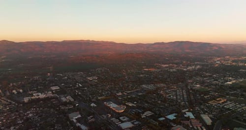 Gorgeous Napa valley at sunset. Beautiful mountains lit with last rays of setting sun at backdrop.