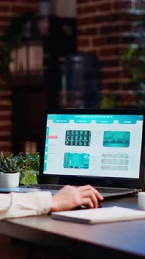 Laptop Screen Showing Business Analytics in Modern Office