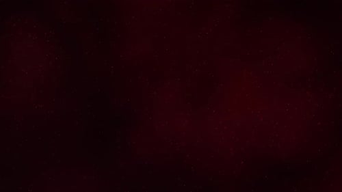 Glamour Collection: Tiny red particles dispersing on a reddish black background