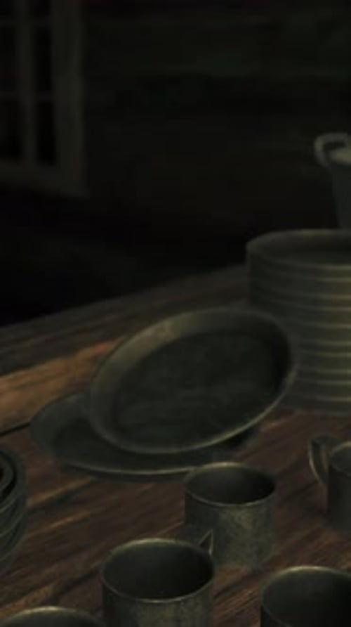 A Table Filled with Various Black Dishes