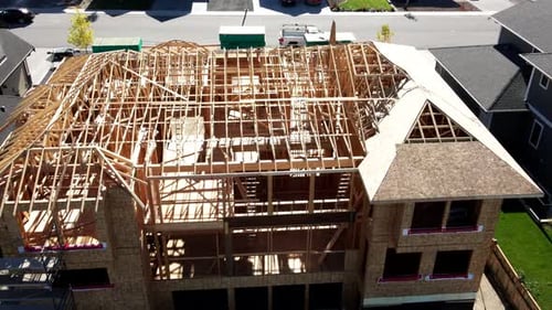 House Construction Frame Aerial View in Suburbs