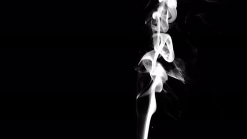 White Smoke Flowing Upward on Black Background