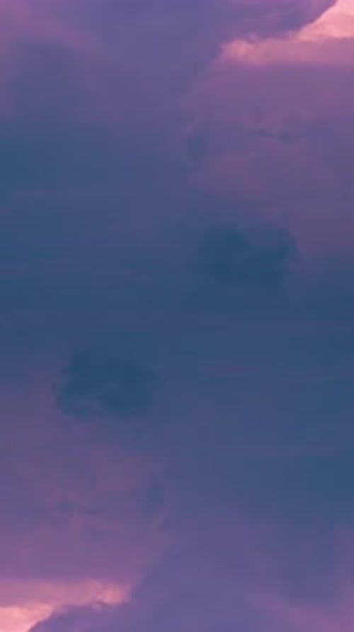 Purple fluffy clouds formation 4k timelapse opener intro Vertical video