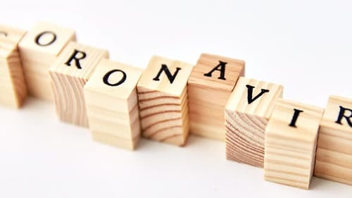 Coronavirus Blocks Spell Out Word on White Background