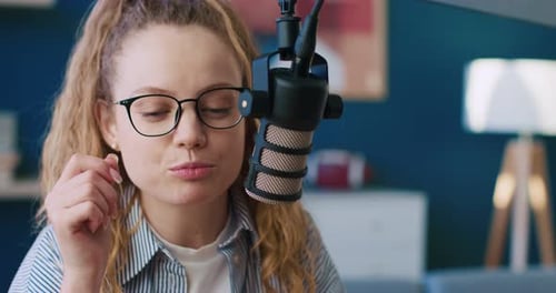 Close Up Shot of Professional Radio Host Leading Morning Program Female Wearing Glasses and Talking