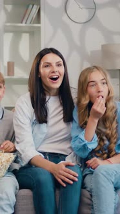 Mom and Kids Enjoy Movie Night at Home