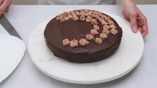 Cutting a Delicious Chocolate Cake