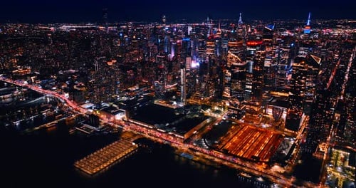Vast luminous cityscape of dazzling New York at night. Gorgeous skyscrapers in the city downtown