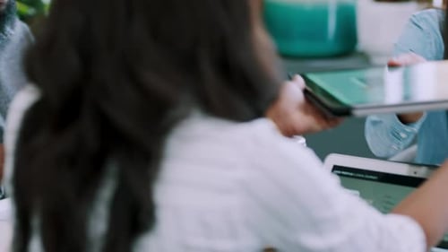 Colleagues Working Together in Modern Workspace