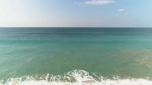 Aerial view over vast sea and horizon on Spanish beach in Los Canos de Meca