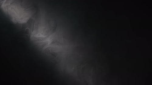 Abstract Smoke Swirls in Dark Mysterious Background