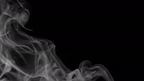 Wispy White Smoke Flowing on Black