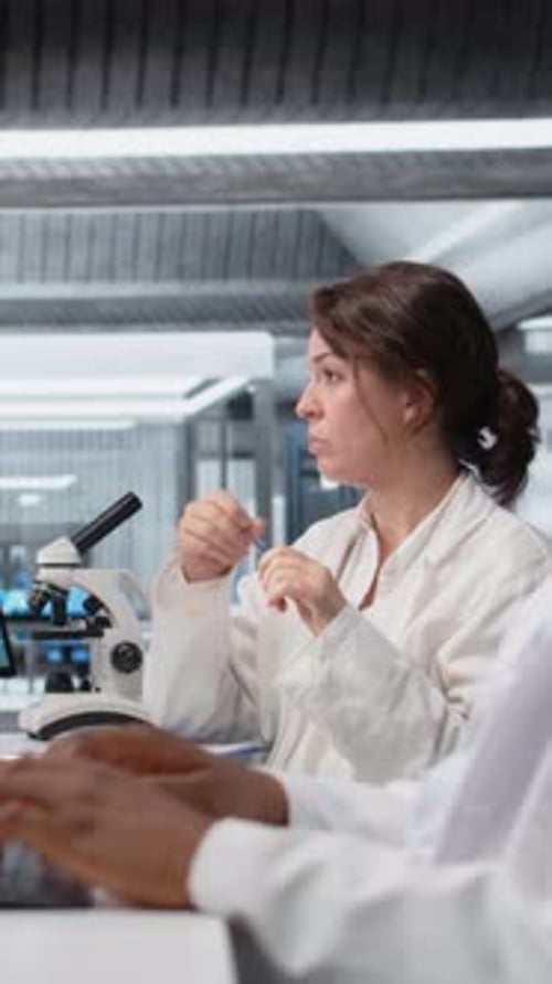 Researchers at Work in Laboratory Setting