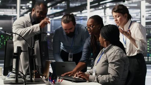 Tech Team Collaborating in a Data Center