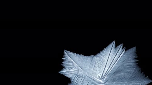 Blue Ice Crystal Forming in Extreme Close Up