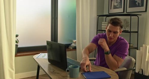 Timelapse of the Working Day of a Man Working in a Home Office