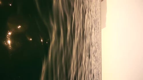 Vertical Aerial View on Sea Water Surface Camera Flies Over Clear Sea Water Sun Glare Abstract