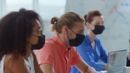 Business People Wearing Protect Gloves and Medical Mask in Modern Office. Multiethnic