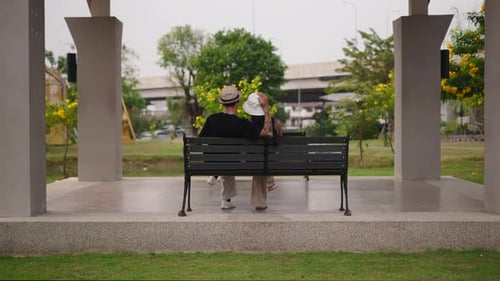 Romantic Couple Enjoying Peaceful Moments Together on a Park Bench