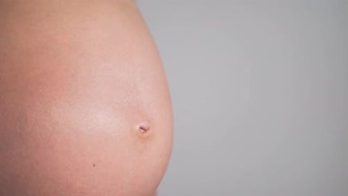 Close Up of Pregnant Woman's Belly