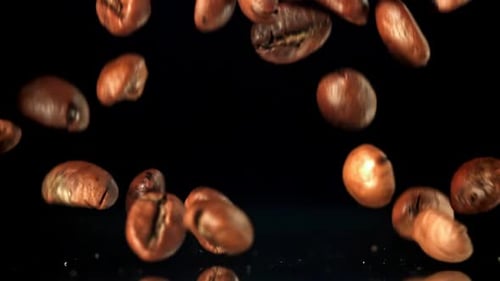 Super Slow Motion Roasted Coffee Beans Filmed on a Highspeed Camera at 1000 Fps