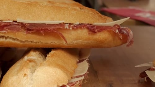 Ham and Cheese Baguette Sandwiches Stacked on Table