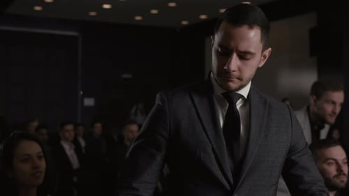 Business Conference Audience Listening to Speaker Presentation