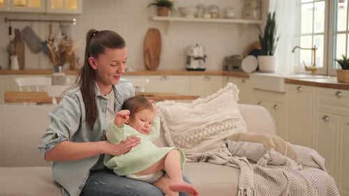 Mother Enjoys Time with her Child at Home