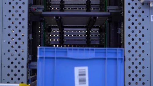 Automatic smart warehouse logistics basket or plastic box container on roller rack aluminum shelf