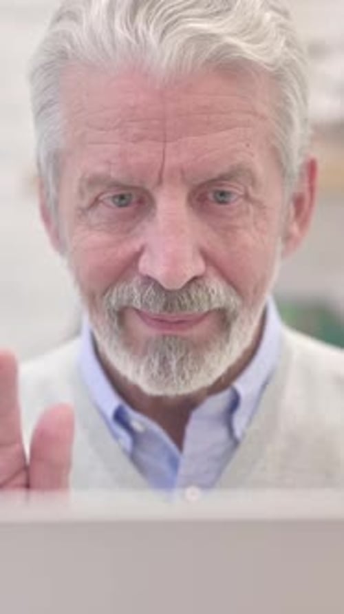 Close Up of Video Chat By Old Man on Laptop, Vertical Video