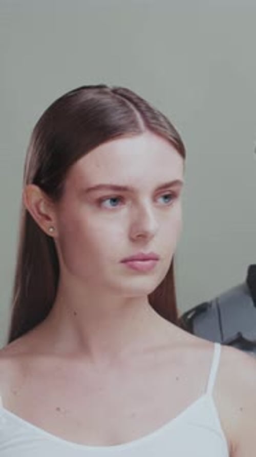 Serene Studio Portrait Contemplative Female Studio Shot Featuring Minimal Makeup and Straightforward