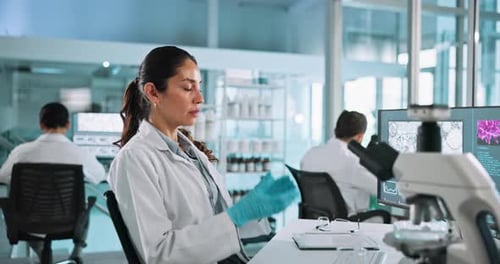 Tired Woman Scientist Working in a Lab