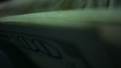 Macro Currency Counting Machine Counting One Hundred Dollar Banknotes. Closeup Of