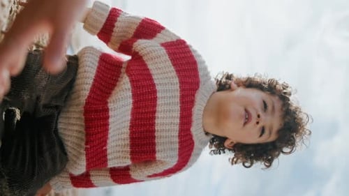 Little Boy Talking Beach with Mother Cloudy Day Child Play Seashore Vertically