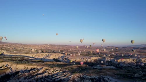 Aerial view of hot air balloons at sunrise, Turkey.