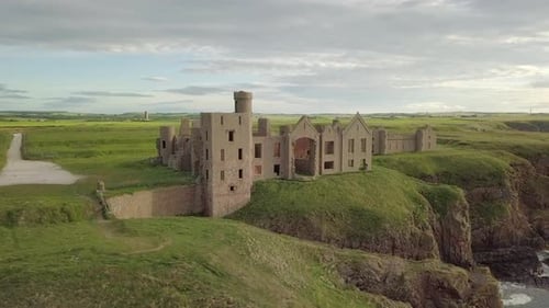 Aerial view of a Slains Castle ruin at sunrise, Aberdeenshire, Scotland