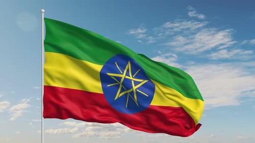 Ethiopian Flag Waving in the Wind with Blue Sky Background