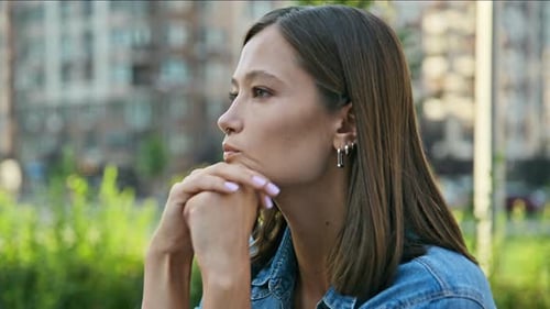 Worried Nervous Young Woman Outdoors Close Up Face