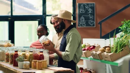 Employee Helping Customers at a Store