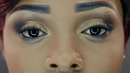 Woman's Eyes with Detailed and Fashionable Makeup