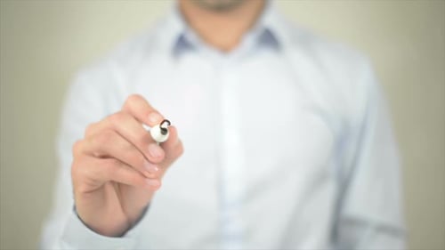 Hand Writes 'Soft Skills' On Transparent Surface