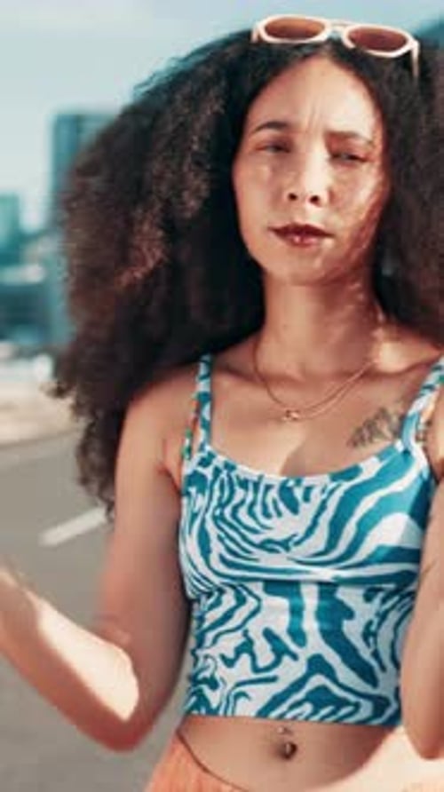 Face, woman and proud for fashion in city with streetwear, edgy clothes and trendy style with afro