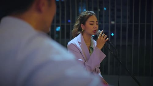 Woman singer singing in a restaurant to entertain customers